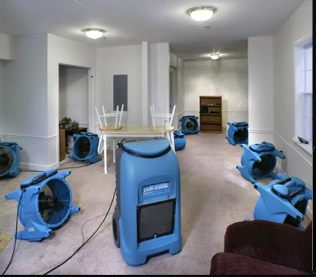 Air movers and dehumidifier setup for Water Damage Restoration in Piedmont